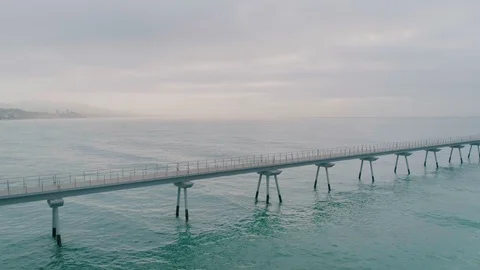 Side view of endless bridge stretch in ocean Stock-Footage 102306494