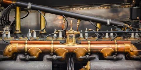 Side view of the engine of an early twentieth century British luxury car Stock Photos