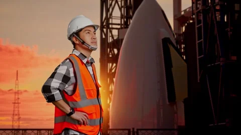 Side View Of Engineer Looking Around With Arms Akimbo With Space Shuttle Stock Footage 273233804