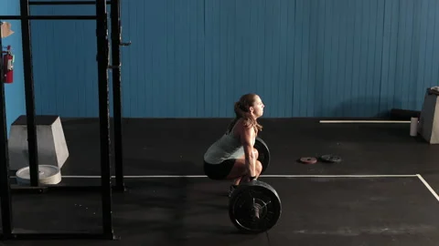 Side view of female power lifter. Stock Footage 133463722