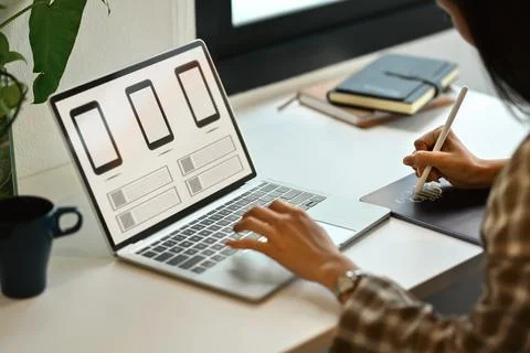 Side view of female website developer planning application development for web Stock Photos