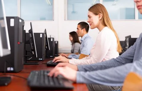 Side view of focused business people during daily work in co-working space 스톡 사진