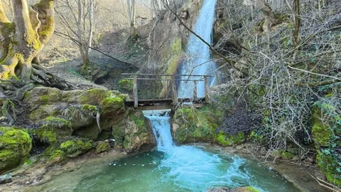 Side View of Forest Waterfall Revealing Natural Pool – Autumn Clear Sky Video stock 330552057