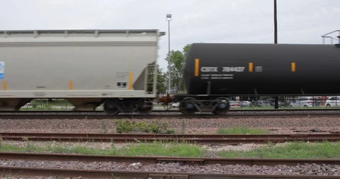 Side View of Freight Train Passing Stock Footage 91955322