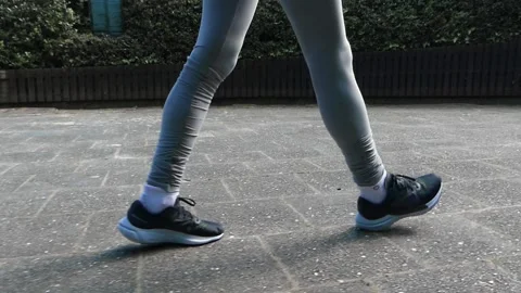 Side view of Girl walking Stock Footage 276351549
