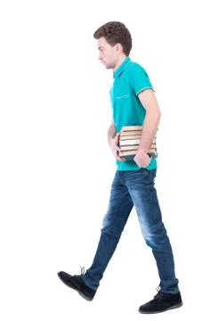 Side view going man carries a stack of books Stock Photos