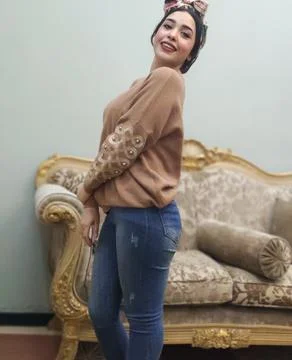 Side view of a good looking attractive Egyptian girl posing for the camera Stock Photos