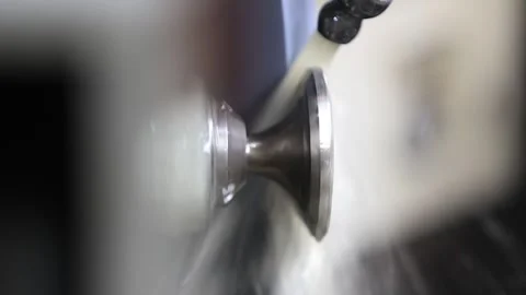 Side view, Grinding process of engine part preciously at factory 스톡 동영상 303455465