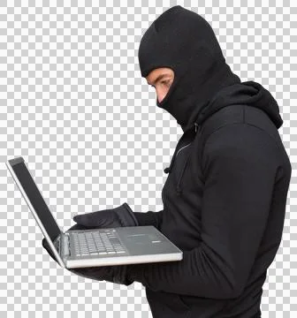 Side view of hacker using laptop Stock Photos