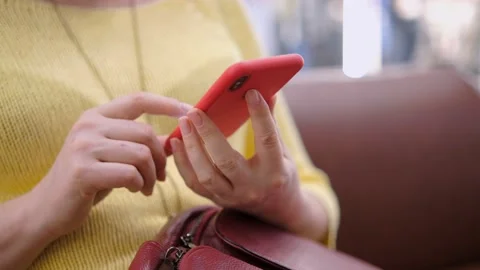 Side view. Hand of girl using smartphone in the shopping center Stock Footage 154074039