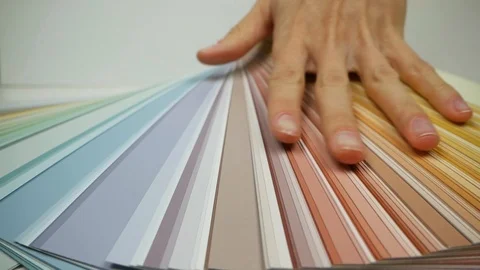 Side view of hand moving on the color palette and opening it. Stock Footage 109043248