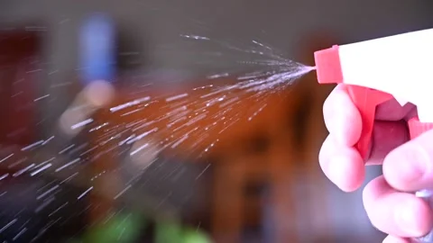 Side view of hand pump spray bottle Stock Footage 138665408