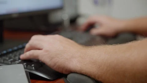 Side View of Hand Using Keyboard and Mouse 스톡 동영상 327358832