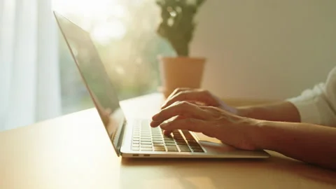 Side view. Hand of woman using laptop, business typing work with computer Stock Footage 238908453