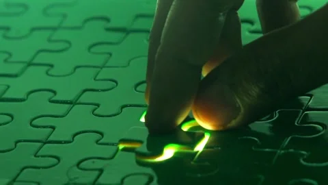 Side view hands of united diverse people taking part assembling white jigsaw Stock Footage 336248393