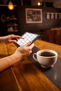 Side view of hands using a tablet computer Stockfoto's