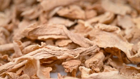 Side view herb JiangPi or Zingiber officinale Rosc or Ginger peel rotating Stock Footage 150083151