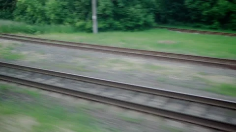 Side view of high-speed turning train on landscape of beautiful nature wild Video stock 159168892
