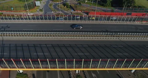 Side View On Highway. Traffic Running At Sunset. Aerial View Stock Footage 91104781