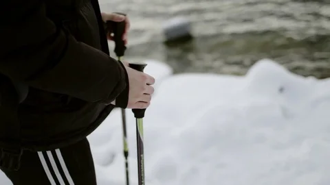 Side view of Hiker at winter lake Stock Footage 70838899