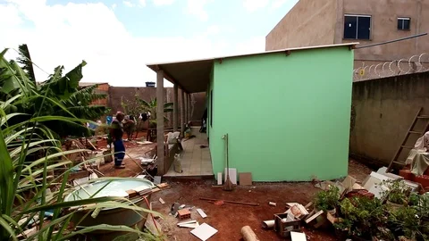 Side View of a Home being Built by Volunteers Stock Footage 118932885