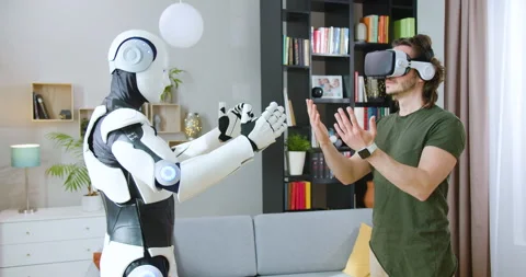 Side view of human like robotic machine repeating all moves of unshaved man in Stock Footage 244137826