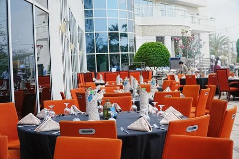 Side view of iftar setting with tables set in the row in five star hotel   Stock Photos