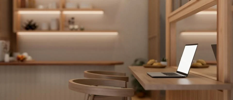 Side view image of a laptop computer on a wooden dining table in a modern, .. 스톡 일러스트