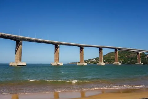Side view of the imposing Third bridge, or Terceira ponte, with its columns.. Stock Photos