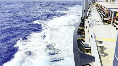 Side View Of Industrial Vessel Deck Crashing Through Sea Water During Daylight Stock Footage 331225182