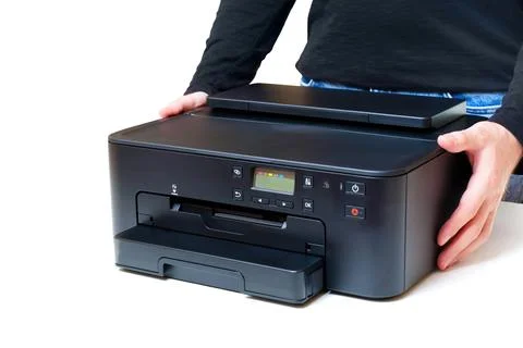 Side View of Inkjet Printer in Hands on White Background 스톡 사진
