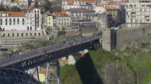 Side view of the iron bridge highlighting the structure and the cliffside. Stock Footage 327624478