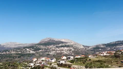 Side View of Klis Hills and Fortress from a Moving Car Stock Footage 331449139