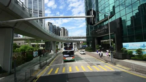Side view of Kowloon while riding on bus along IEC near Quarry Bay Part AB Stock Footage 228048526