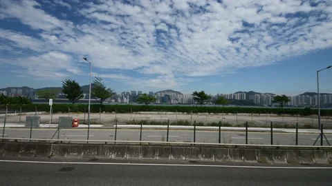 Side view of Kowloon while riding on bus along IEC near Quarry Bay Part BB Stock Footage 228048566