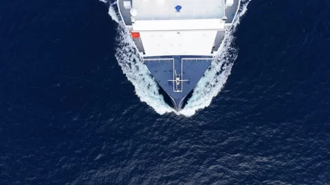 Side view of large cargo ship sailing on open ocean Stock Footage 335664091