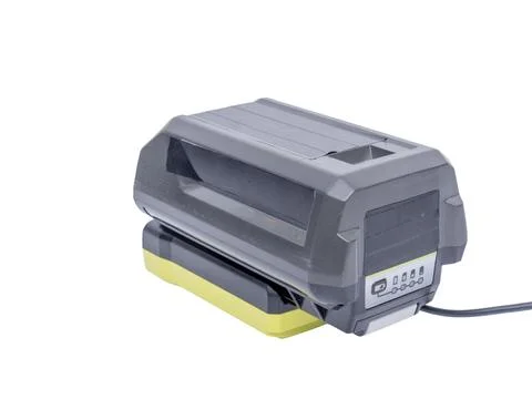 Side view of a lithium ion battery on charge on a white background Stock Photos