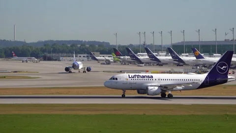 Side view of Lufthansa CityLine passenger airplane landing Stock Footage 246708768