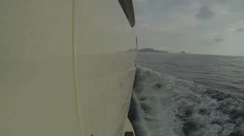Side view of luxury yacht navigating Stock Footage 68457189
