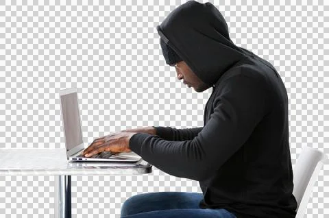 Side view of male hacker using laptop Stock Photos