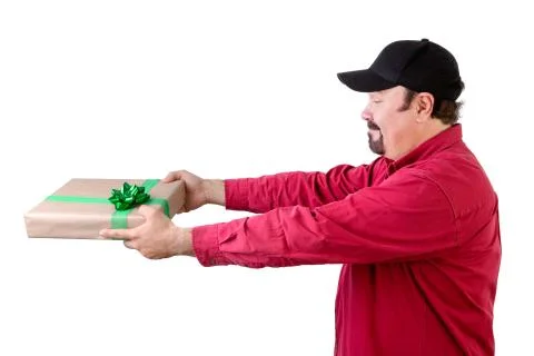Side view of man giving wrapped present on white Stock Photos