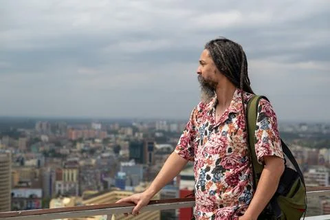Side view of man seen looking at city Stock Photos