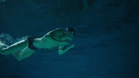 Side view of a man swimmer Stock Footage 283138317