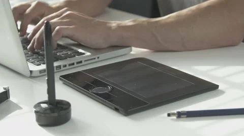 Side view man using his pen tablet Stock Footage 64776668