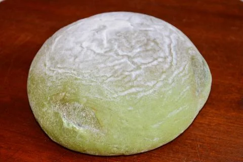 Side view of matcha bread on the brown wood board Stock Photos