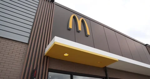 Side View of McDonald’s Featuring Golden Arches Stock Footage 317528599