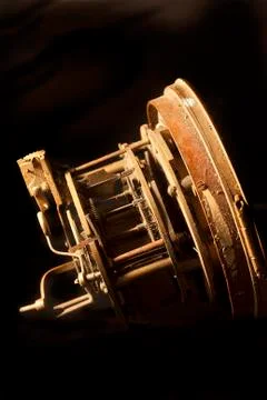 Side view of the mechanics inside of an old clock Stock Photos