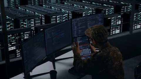 Side View Of Military Working With Tablet While Write Code In Data Center Stockbeeldmateriaal 271149077