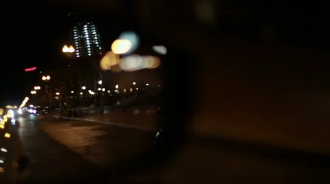 Side view mirror night cyclist Stock Footage 33289960