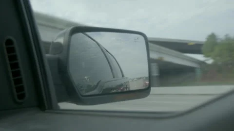 Side View Mirror Reflection While Driving on Highway Stock Footage 343881352